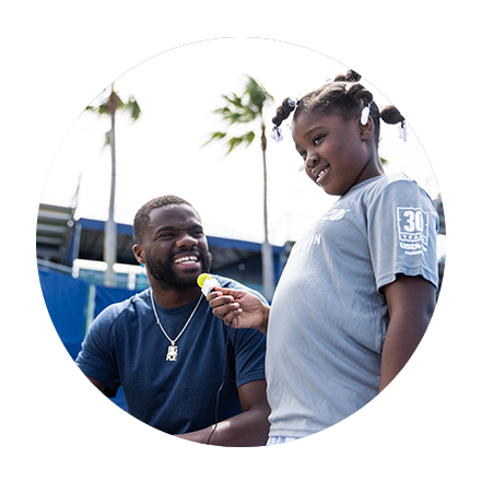 Frances Tiafoe and USTAF student