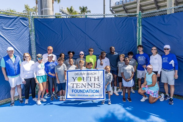 Frances Tiafoe with NJTL youth and the USTA Foundation at the Delray Beach Tennis Center in Delray Beach, Fla.