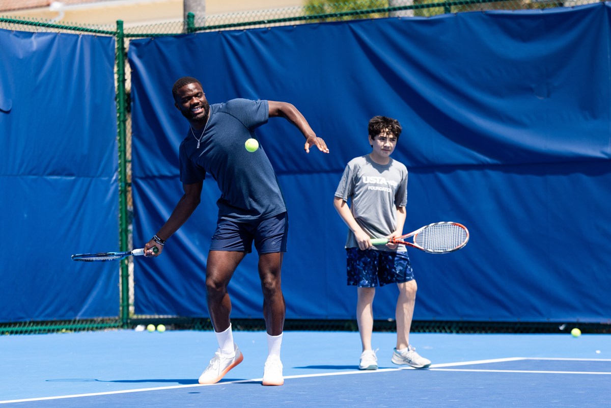 Francis Tiafoe playing with student in Delray Beach. Francis Tiafoe playing with student in Delray Beach.