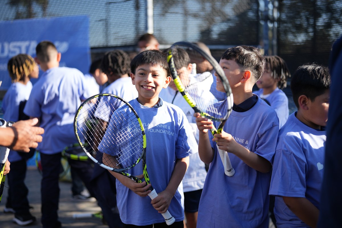 Students with racquets at SoCal and BGCMLA clinic.
