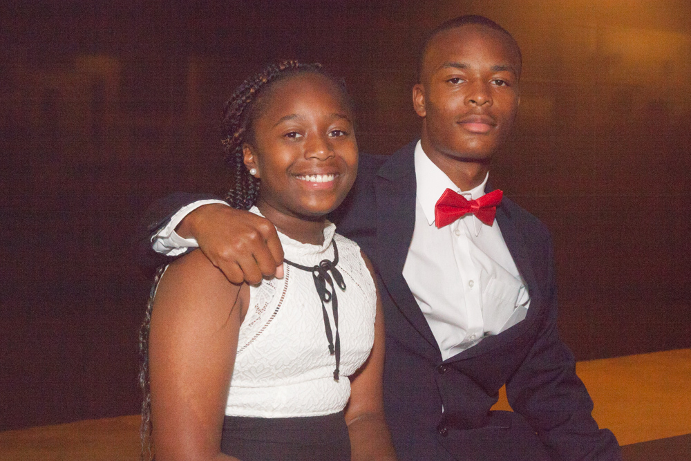 Jabeiro Brown and his sister Mauricia at a MWYF event smiling.