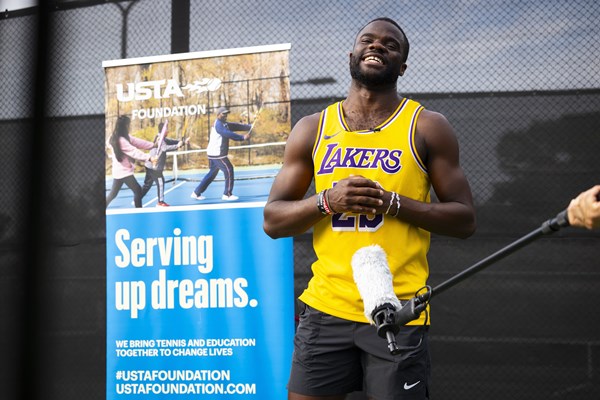 Frances Tiafoe joins the USTA Foundation to host a clinic with local kids as part of the U.S. Men's Clay Court Championships on Monday, April 1, 2024, in Houston, Texas. © Annie Mulligan