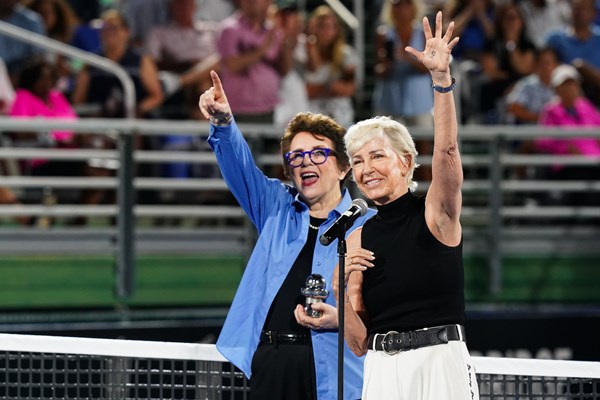 Chris Evert receives the ITF Excellence Award from Billie Jean King, both cheering in the picture, during the Billie Jean King Cup Qualifier tie between the USA and Austria at the Delray Beach Tennis Center