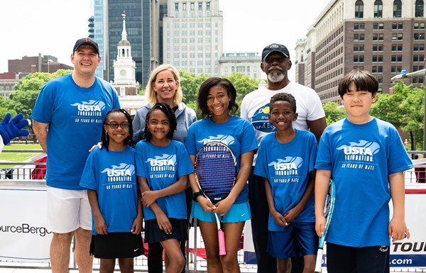 People in USTA Foundation shirts in Philadelphia raising money for Rally to Rebuild